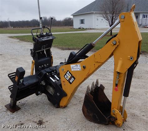 backhoe attachment for caterpillar skid steer|caterpillar attachments for skid steer.